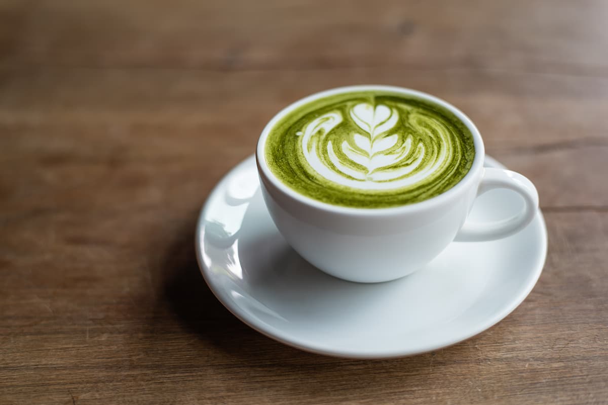 Input: Sketch Barista Pouring Matcha Latte
